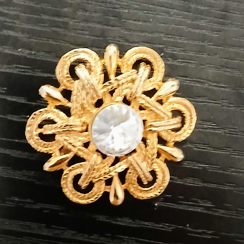 Gold-Tone Floral Knot Brooch with Clear Center Stone